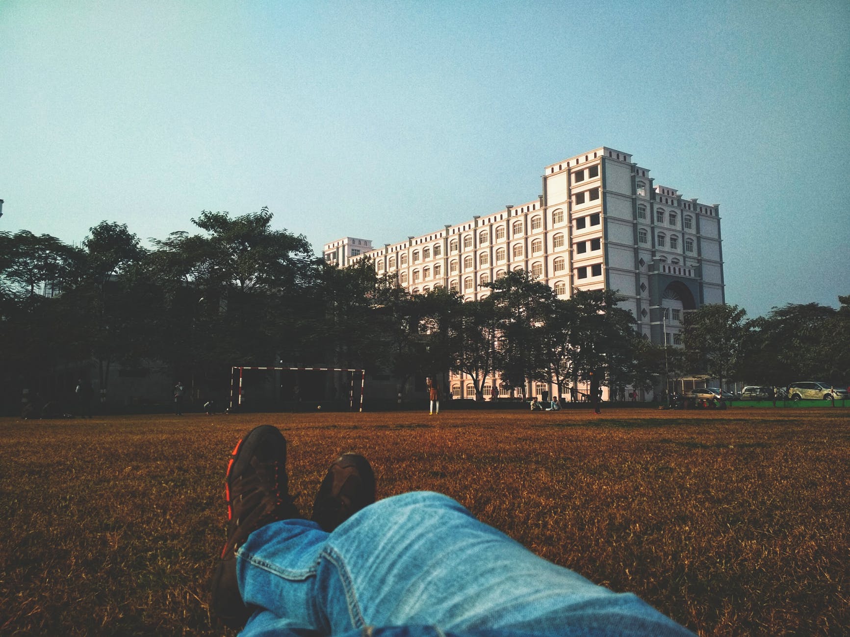 person laying on a soccer fields