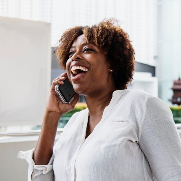 woman laughing on the phone